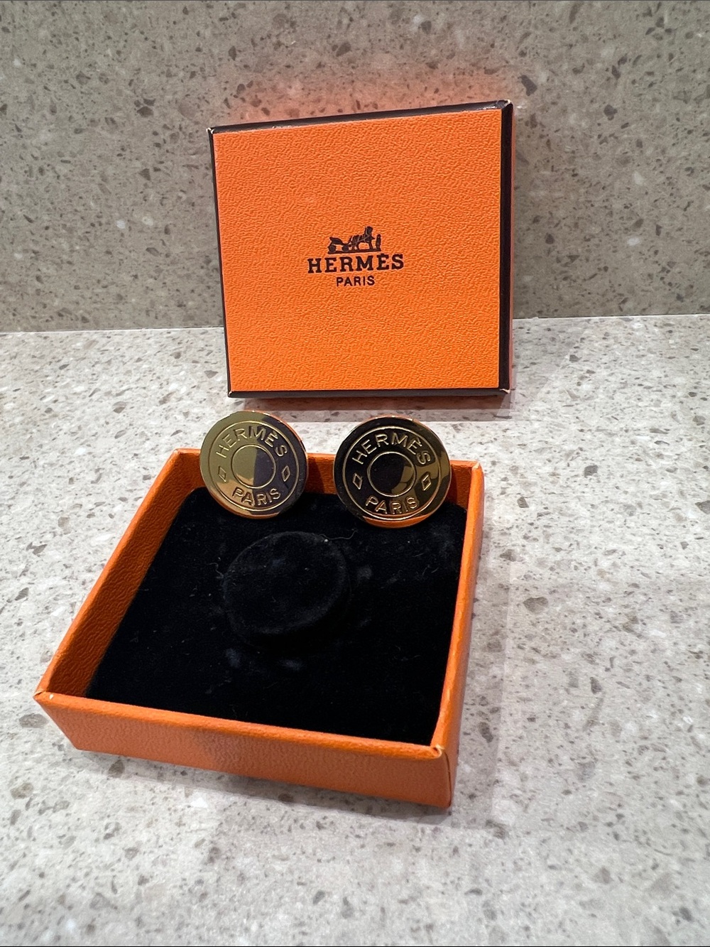 Hermes Gold Logo Clip on earrings